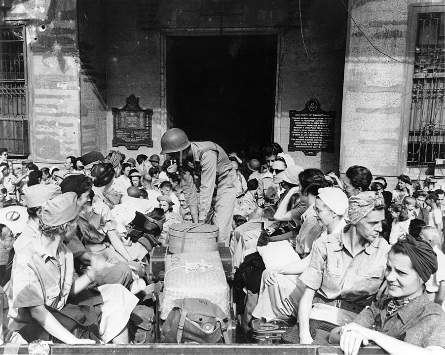 Army Nurses being rescued from Santo Tomas, Philippines - 1945.