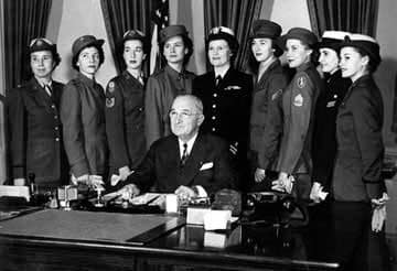 President Truman signs the Women's Armed Forces Inegration Act of 1948