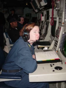 Safe Place: A Sailor sits at a console on a Navy ship.